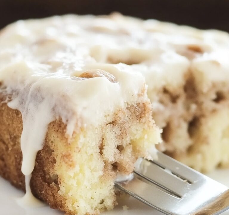 Gooey Cinnamon Roll Poke Cake Recipe