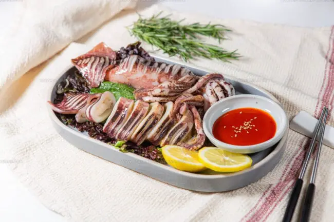 What Spices and Marinades Are Commonly Used in Squid Dishes Across Cultures?